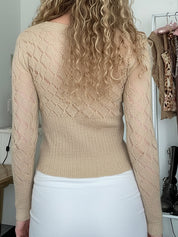 Retro-Inspired Cross V-Neck Sweaters