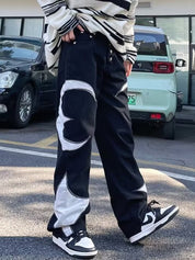 Men's Leather Embroidery Splice Loose Jeans