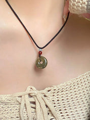 Hollow Out Jade Pendant Braided Rope Necklace