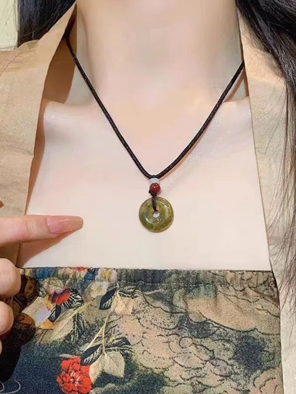 Hollow Out Jade Pendant Braided Rope Necklace