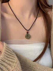 Hollow Out Jade Pendant Braided Rope Necklace