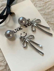 Long Pearl Bow Earring